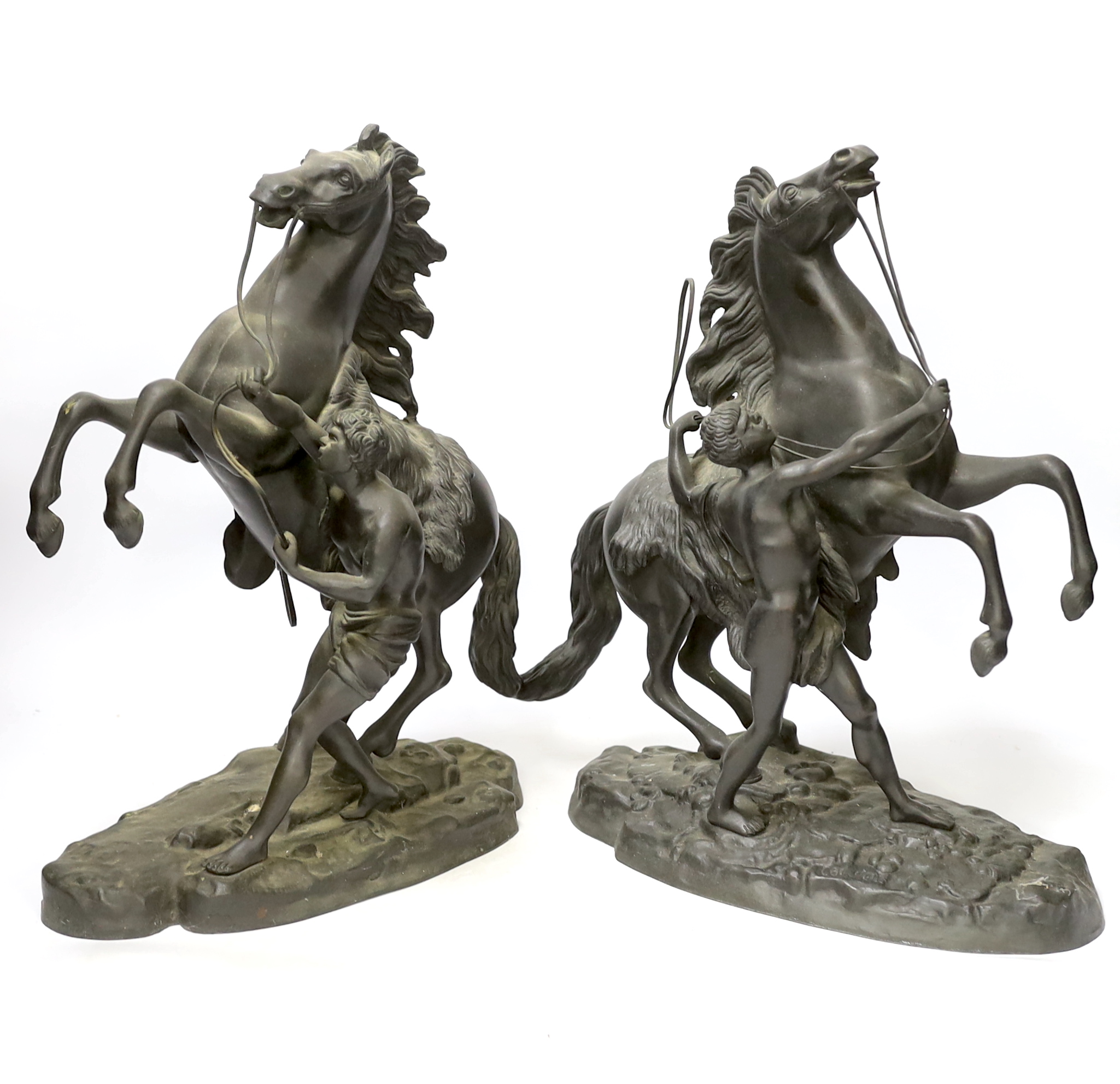 After Guillaume Coustou (1677-1746), a pair of bronze Marly horses, 37cm